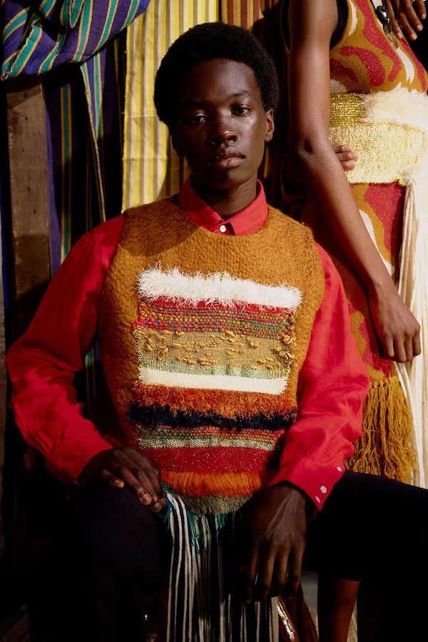Male model in sweater by African designer