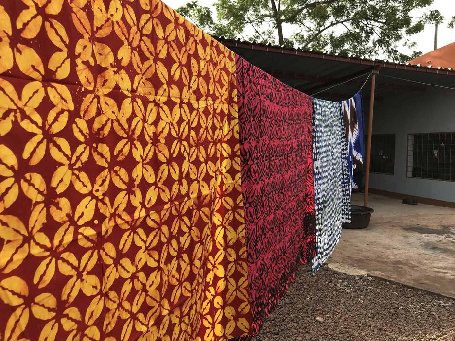 Clothing line with bright fabrics drying