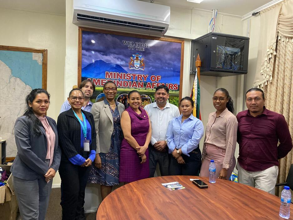 Group of officials in government office in Guyana