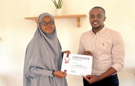 Woman receives certificate