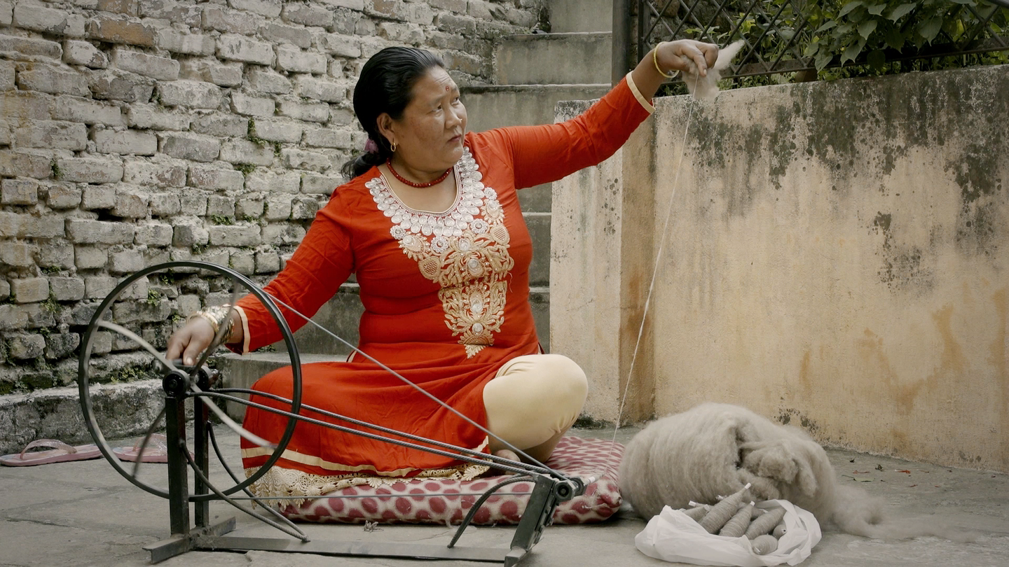 Woman Hand Spinning Cashmere