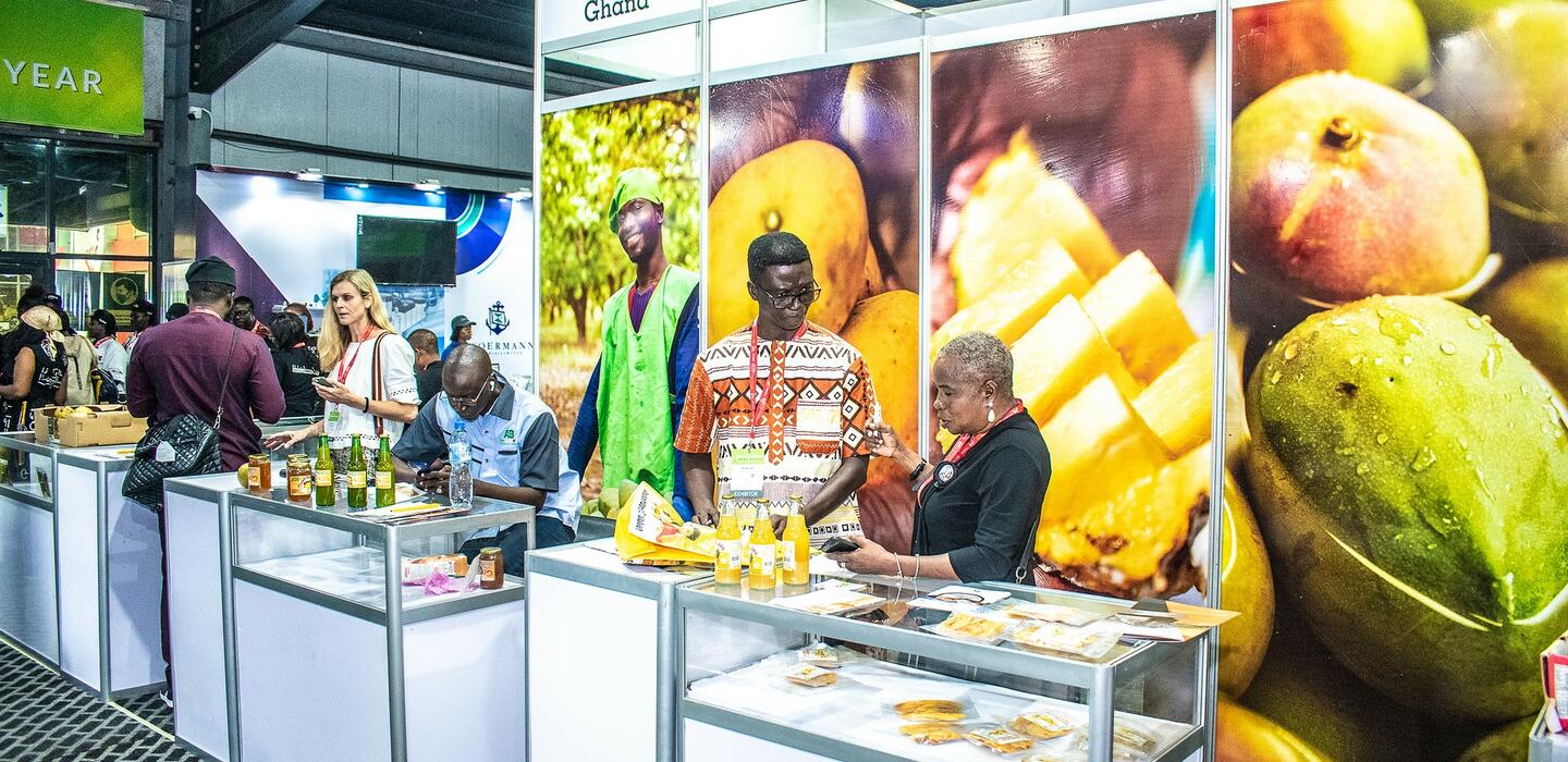 West Africa producers of mango products show their goods at a trade fair